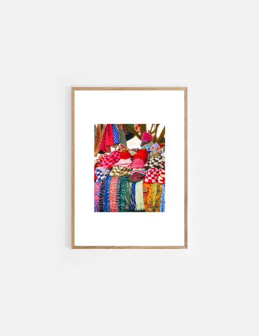 Framed artwork of colorful hats