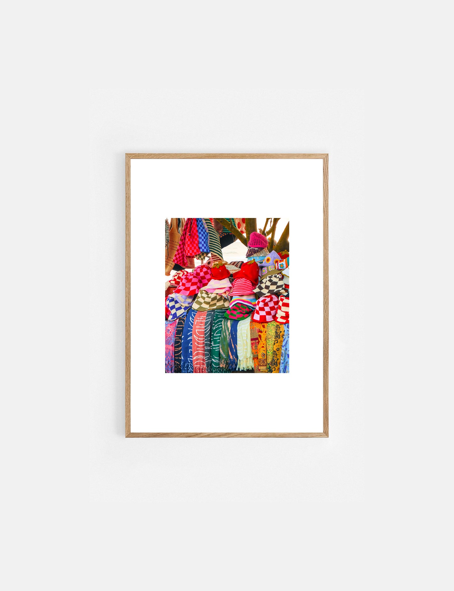 Framed artwork of colorful hats