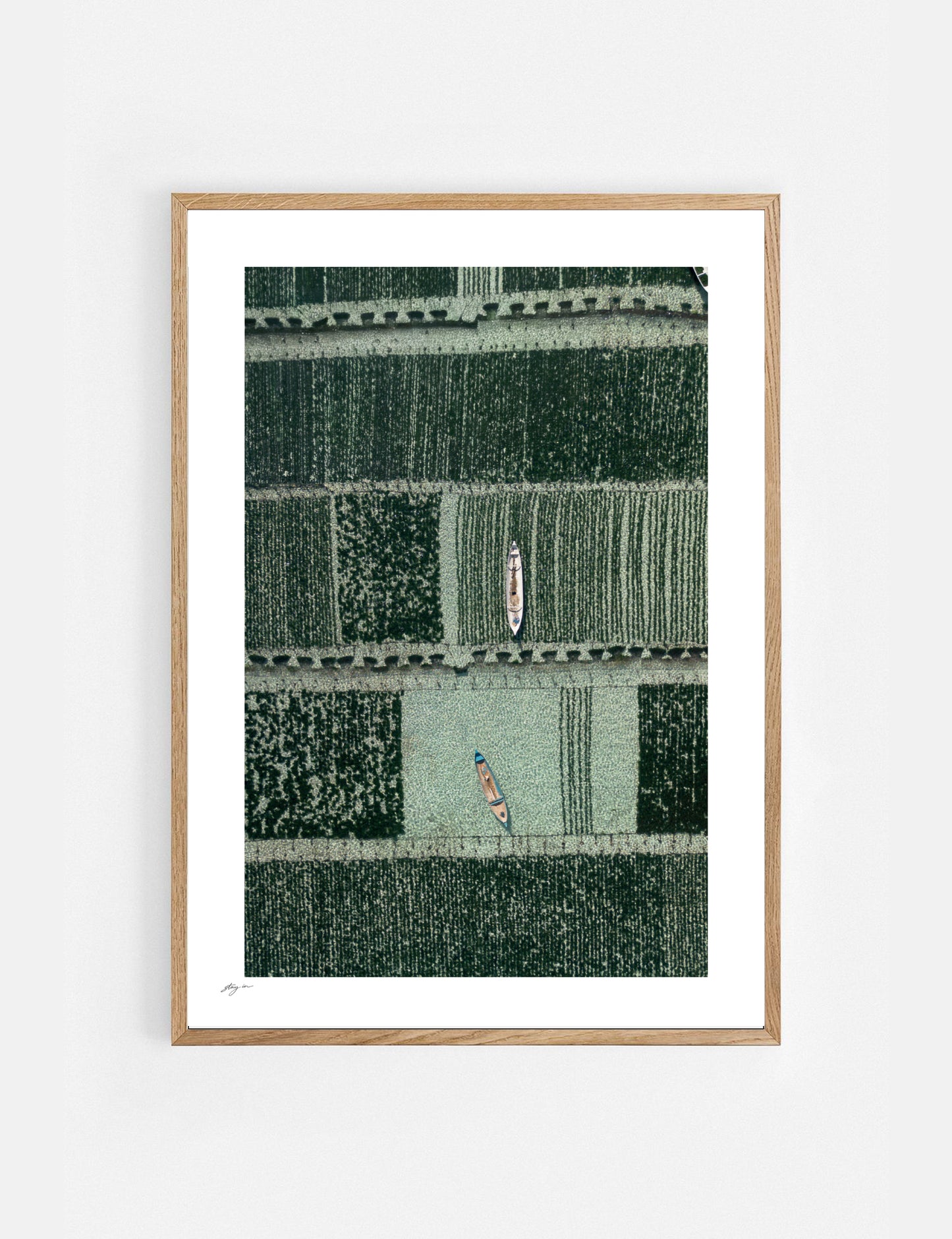 Framed artwork with a geometric pattern on a white background