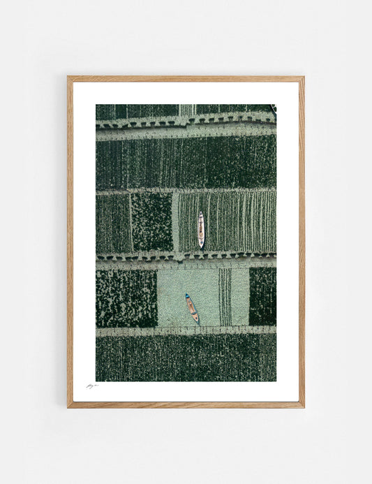 Framed artwork with a geometric pattern on a white background